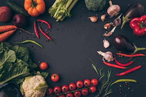 Premium Photo Top View Of Unprocessed Vegetables On A Gray Table