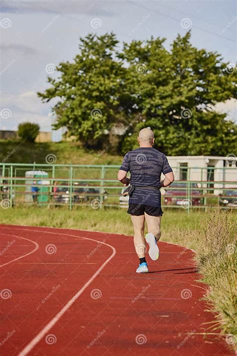 Man Running On A Running Track Stock Photo Image Of Athletic Healthy