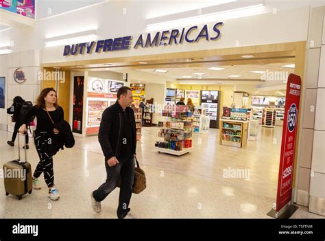 People At The Duty Free Americas Shop In The Terminal JFK Airport