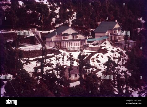 Houses Surrounded By Snow Dalhousie Himachal Pradesh India Stock