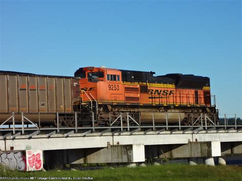 N B Loaded BNSF Coal Train With Trailing DPU BNSF 9253