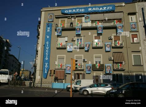 Naples Italy Serie A championship 2023. Building decorated with pictures of the Napoli football ...