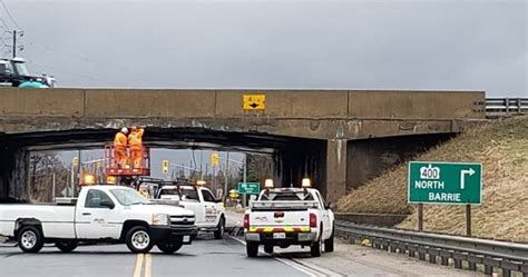 Driver Charged After Transport Truck Hits Hwy 400 Overpass South