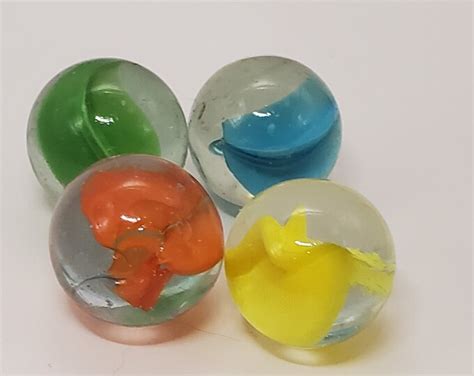 4 Vintage Cat S Eye Shooters 1 Shooters Vintage Marbles Blue Green Yellow And Orange Glass