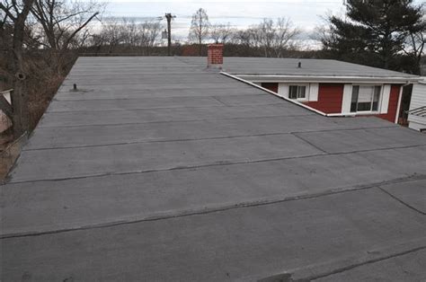 Flat Roof Rubber Membrane Installation and Repairs- watch Video