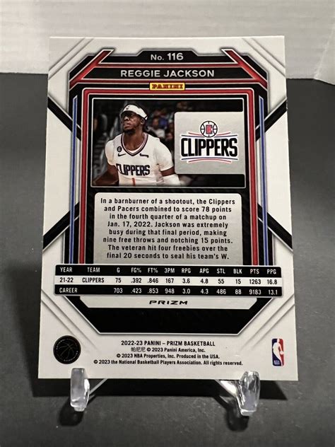 2022 23 Panini Prizm Reggie Jackson Red Cracked Ice Prizm 116 Clippers