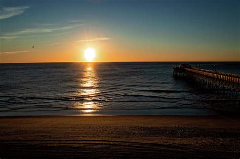 Myrtle Beach Sunrise-beach pier and ocean Photograph by Phillip Foster ...