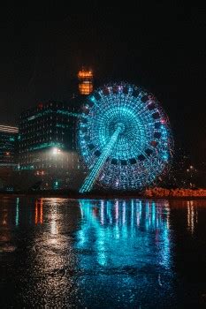 Kostenlose Hintergrundbilder Blaues Und Weißes Riesenrad Während Der