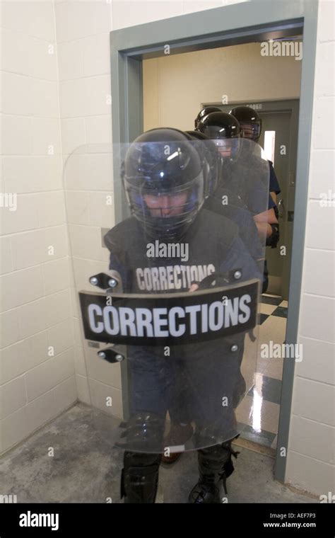 Cert Team Entering Cell To Make An Extraction Of A Barricaded Inmate