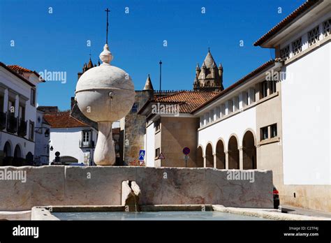 A Fountain And Water Trough In The Centre Of Evora Portugal Stock