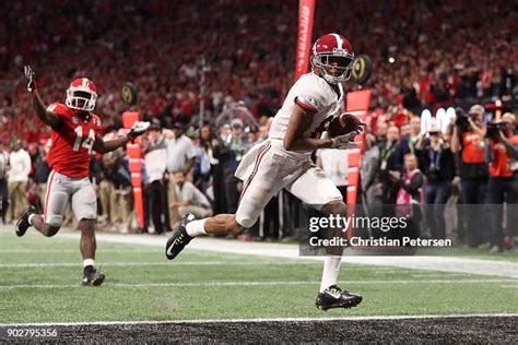 DeVonta Smith of the Alabama Crimson Tide catches a 41 yard touchdown ...