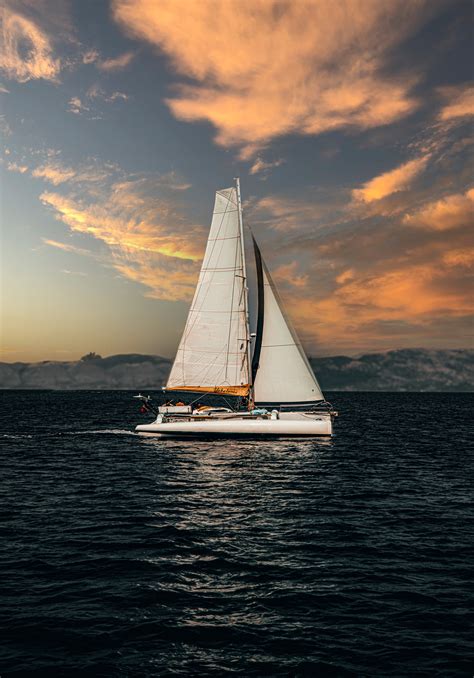 Sailing Boat on Body of Water · Free Stock Photo