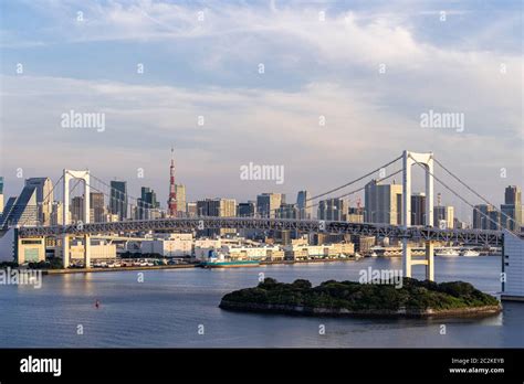 Aerial View Of Tokyo Skylines With Rainbow Bridge And Tokyo Tower Over