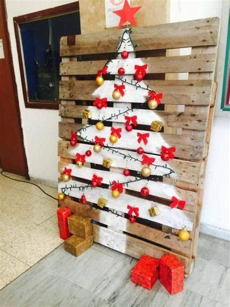 A Christmas Tree Made Out Of Wooden Pallets