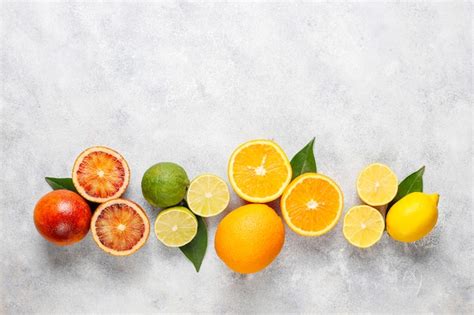 Free Photo | Citrus background with assorted fresh-citrus fruits