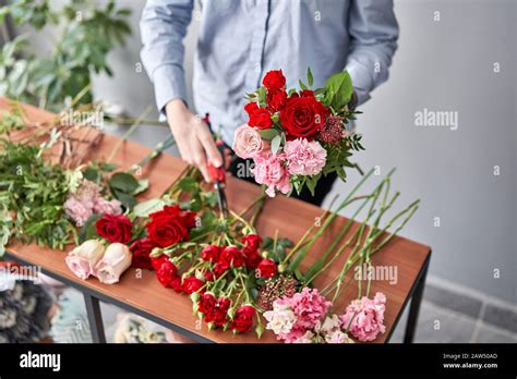 Woman Florist Creating Beautiful Bouquet In Flower Shop Work In Flower