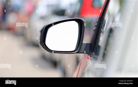 white background , side view mirror car in rush hour traffic Stock ...