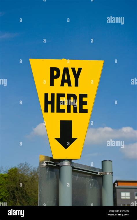 Pay Here Sign Stock Photo - Alamy