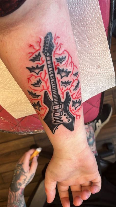 Eddie Munson Guitar Tattoo Stranger Things Tattoo Hand And Finger Tattoos Tattoo Designs