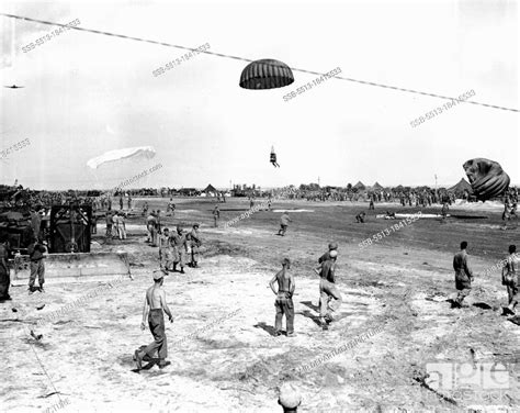 Action At Noemfoor U S Paratroopers Have Interested Spectators For