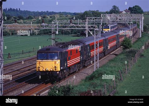 Class 87 electric locomotive with a Virgin West Coast mainline train ...