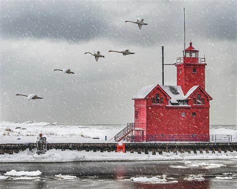 Big Red Lighthouse Swan Flyby Photograph By Roger Swieringa Pixels