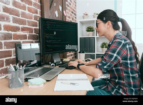 Beauty Smiling Female Programmer Using Computer Working In Office And