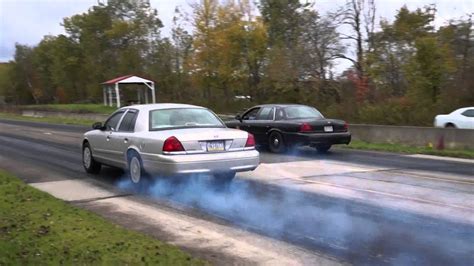 Supercharged Crown Vic Vs Stock Crown Vic Drag Race Youtube