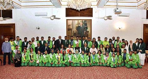 President Dr Arif Alvi And Begum Samina Arif Alvi In A Group Photo