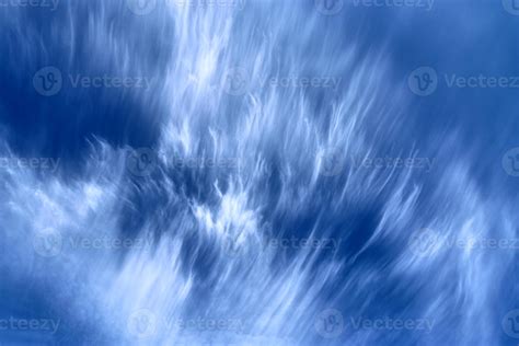 Stunning cirrus cloud formation panorama in a deep blue sky 12055998