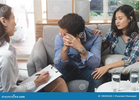 Psychologist Talking With Married Couple And Checking Mental Health