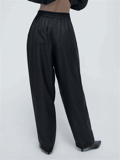 Silk Twill Slouch Pants In Black Designer Boutique International