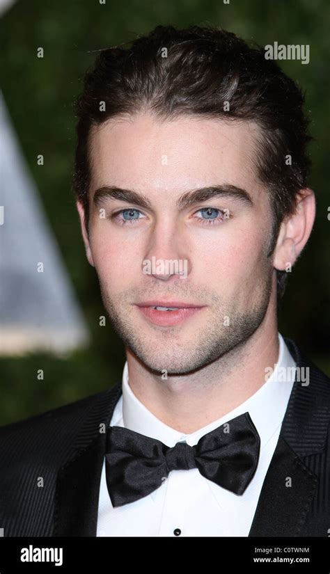 CHASE CRAWFORD 2011 VANITY FAIR OSCAR PARTY LOS ANGELES CALIFORNIA USA ...