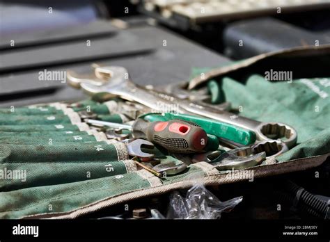 car mechanic tool set in auto repair shop Stock Photo - Alamy