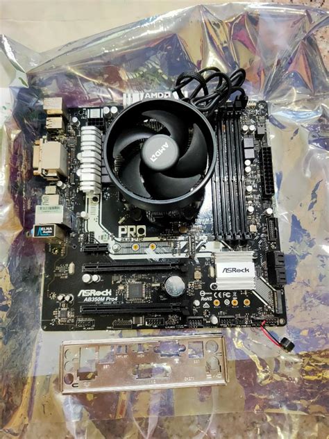 Asrock Ab350m Pro 4 With Ryzen 5 1600 Electronics Computer Parts And Accessories On Carousell