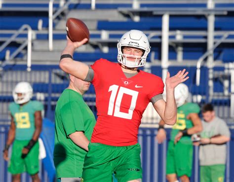 Oregon Ducks Quarterback Justin Herbert 10 Throws A Ball During A