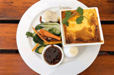 A South African Favourite Traditional Bobotie With Fragrant Yellow Rice