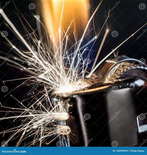 Lighter Igniting Sparks stock image. Image of black - 144995999