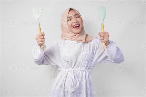 Muslim Woman Cooking Stock Photos, Images and Backgrounds for Free Download