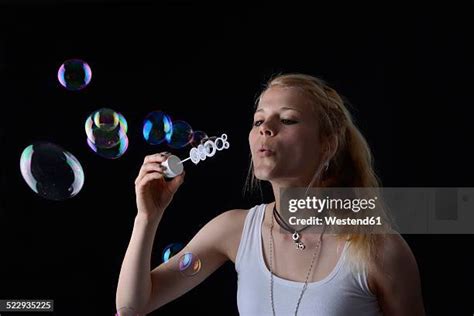 Blow Soap Bubbles Photos And Premium High Res Pictures Getty Images