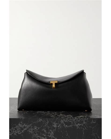 Tot Me T Lock Leather Clutch In Black Lyst