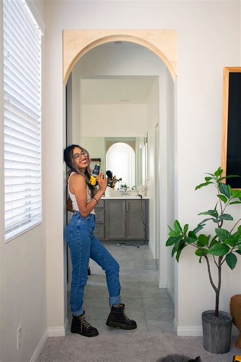 This DIYer Turned Her Straight Hallway Into an Arched One for $35