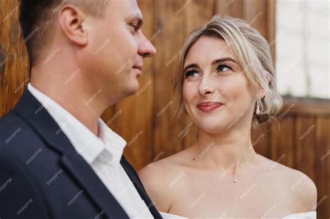 Premium Photo Happy Bride And Groom Looking At Each Other With A Smile