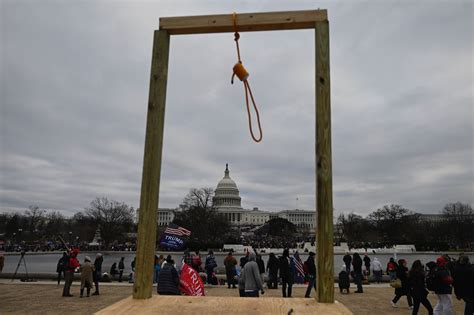 D C Riot MAGA Fanatics Erect GALLOWS Outside US Capitol As Building