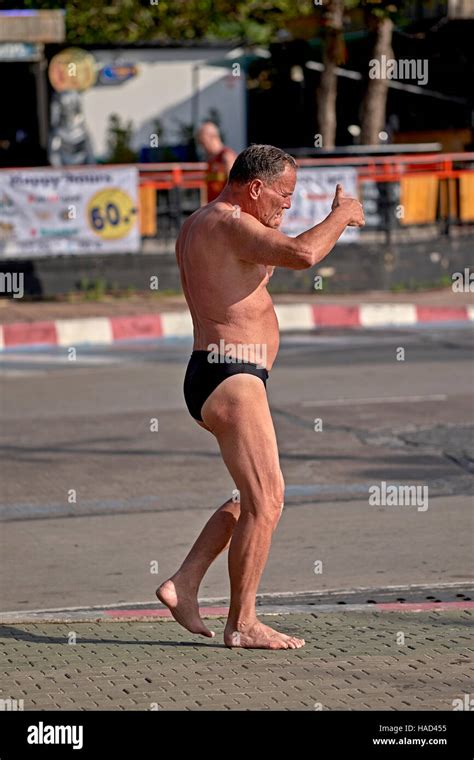 Inappropriately Dressed Caucasian Male Wearing Speedos Swimming Stock