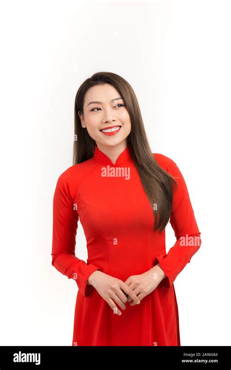 Close Up Portrait Of Beautiful Asian Girl Dressed In Traditional Ao Dai