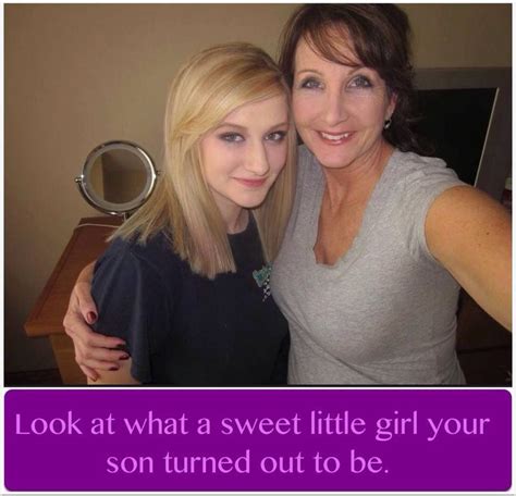 Two Women Are Posing For The Camera With Their Arms Around Each Other