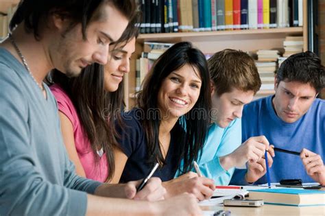 College Students Studying Together In A Library Stock Photo Image Of