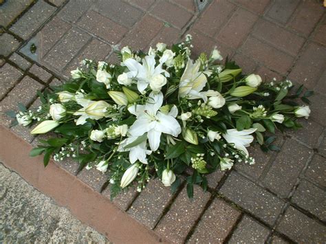 Serene All White Small Casket Spray Casket Flowers Funeral Flowers