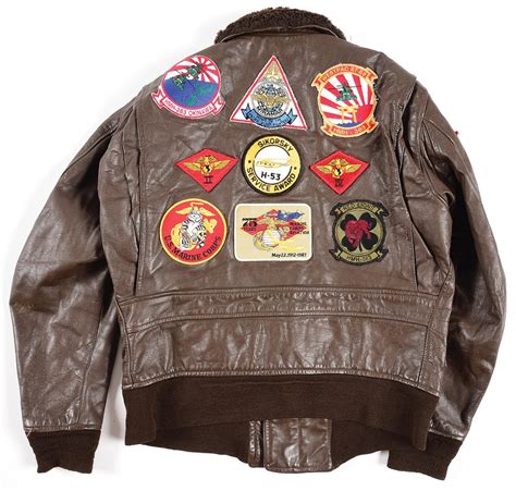 Lot Detail - LOT OF 8: 6 USMC FLIGHT JACKETS AND 2 FLIGHT SUITS